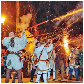 Musket volley marks the Change of Flags ceremony