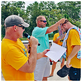 Fans cheer on St Johns Splash team during county swim meet