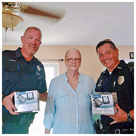 Local resident receives gift of security lights for her home